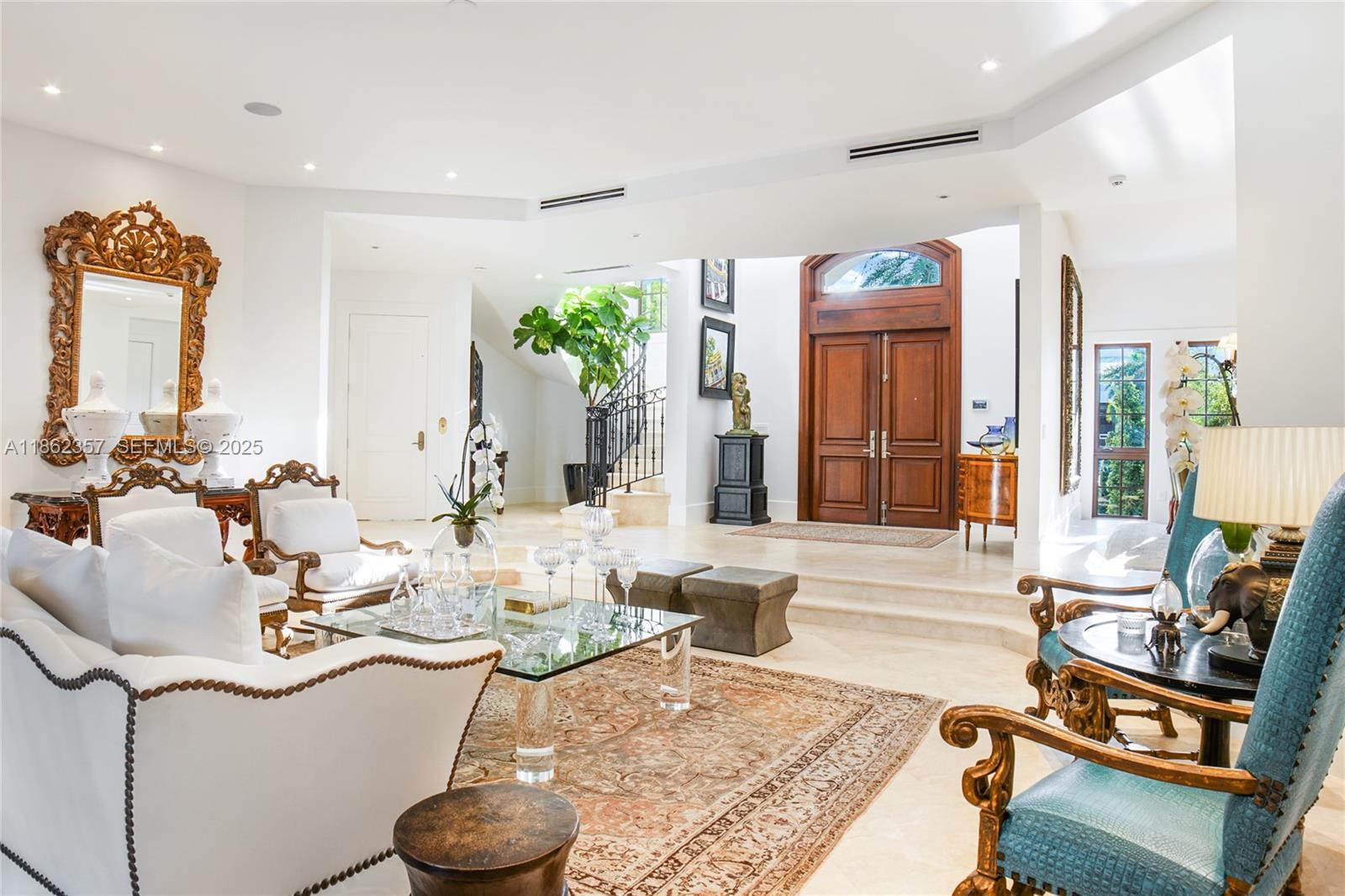 365 Gulf Road Key Biscayne, FL 33149 - Photo 28 of 29 a living room with furniture and a large window