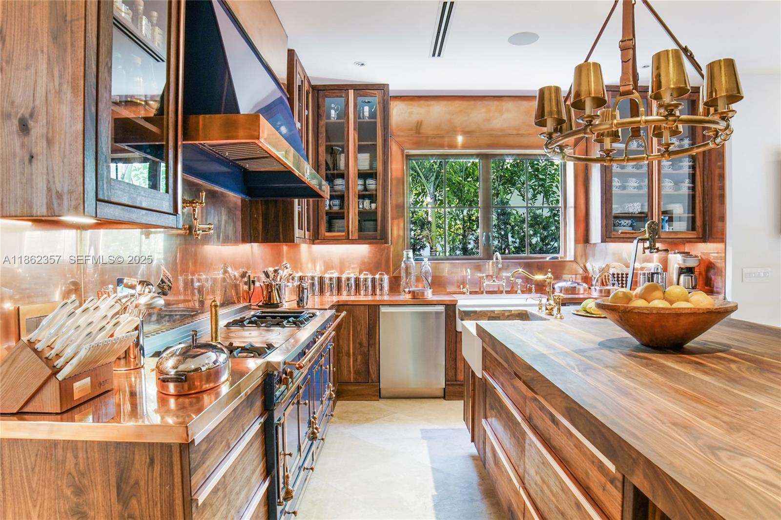 365 Gulf Road Key Biscayne, FL 33149 - Photo 10 of 29 a very nice looking kitchen with a large window