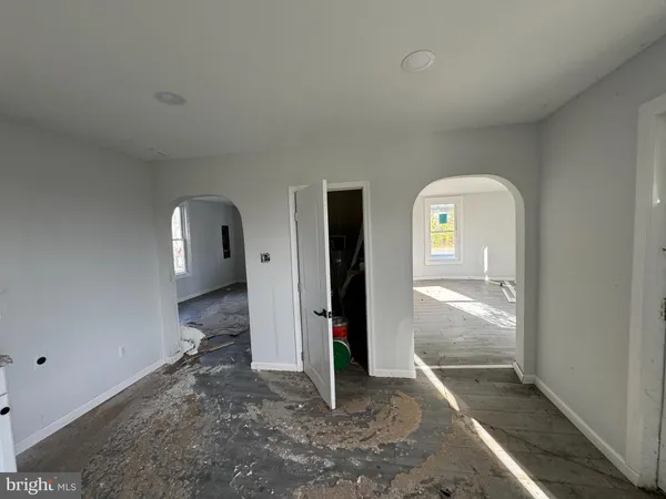 a view of entryway with wooden floor