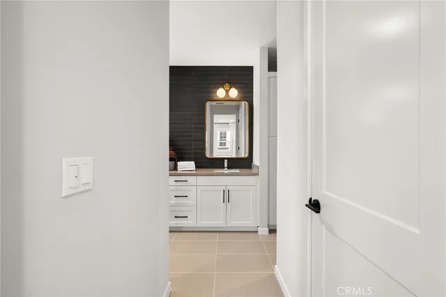 a view of a bathroom from the hallway
