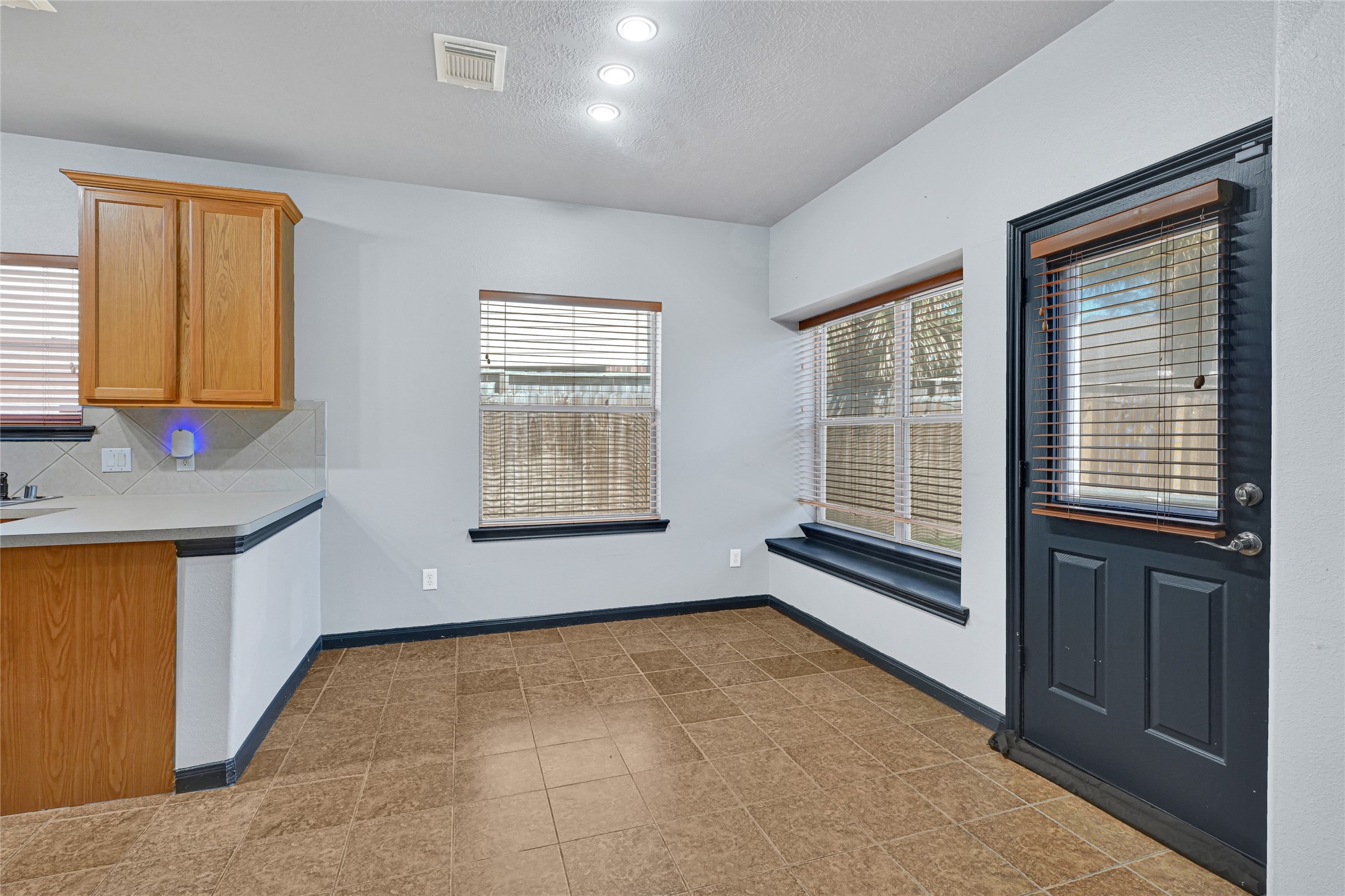 8514 Discus Drive Humble, TX 77346 - Photo 13 of 32 a view of an empty room with a window