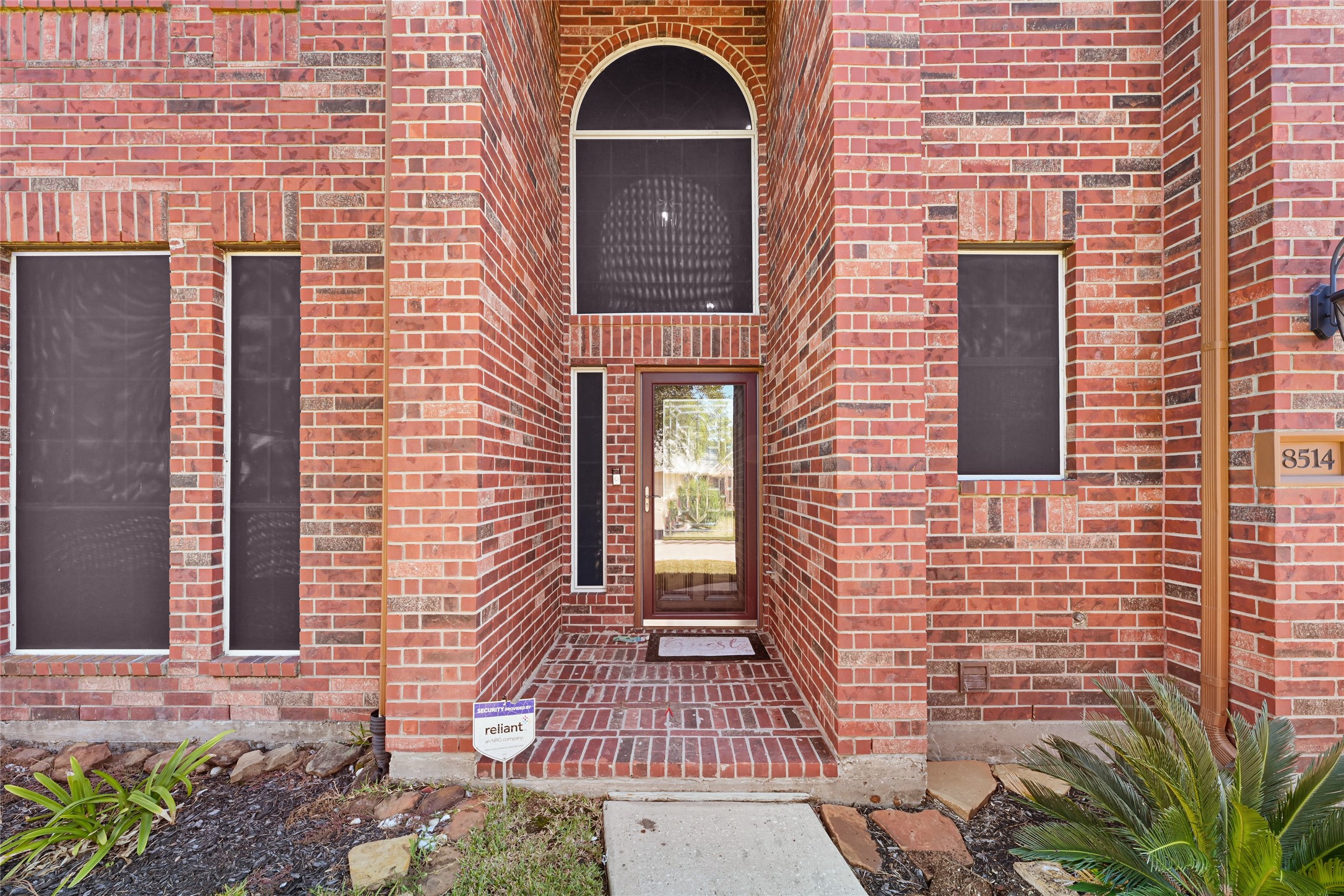 8514 Discus Drive Humble, TX 77346 - Photo 3 of 32 a front view of a house with a door