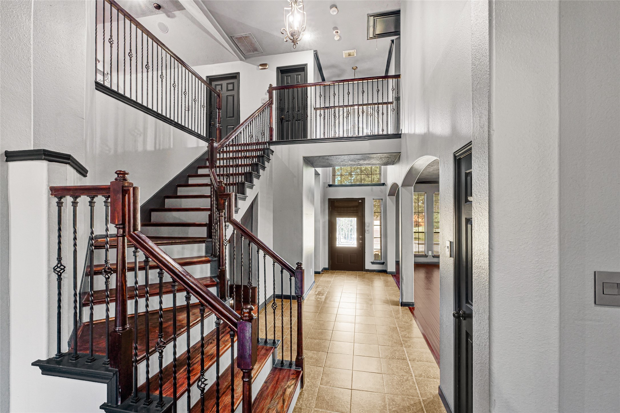 8514 Discus Drive Humble, TX 77346 - Photo 5 of 32 a view of entryway and hall with wooden floor