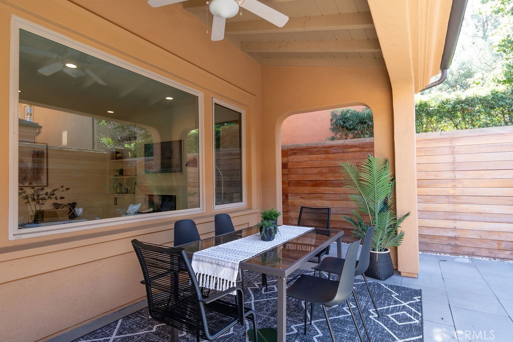 58 Cipresso Irvine, CA 92618 - Photo 20 of 34 a view of an outdoor dining space with a table and chairs