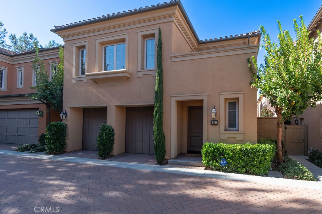 58 Cipresso Irvine, CA 92618 - Photo 2 of 34 front view of a house with a yard