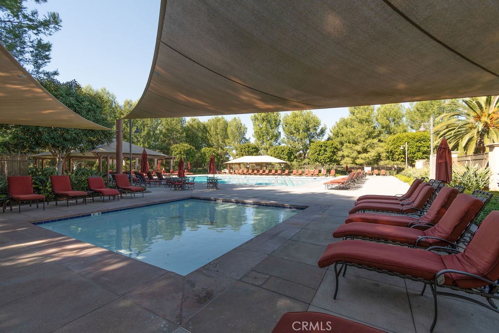 58 Cipresso Irvine, CA 92618 - Photo 28 of 34 a view of a swimming pool with a patio