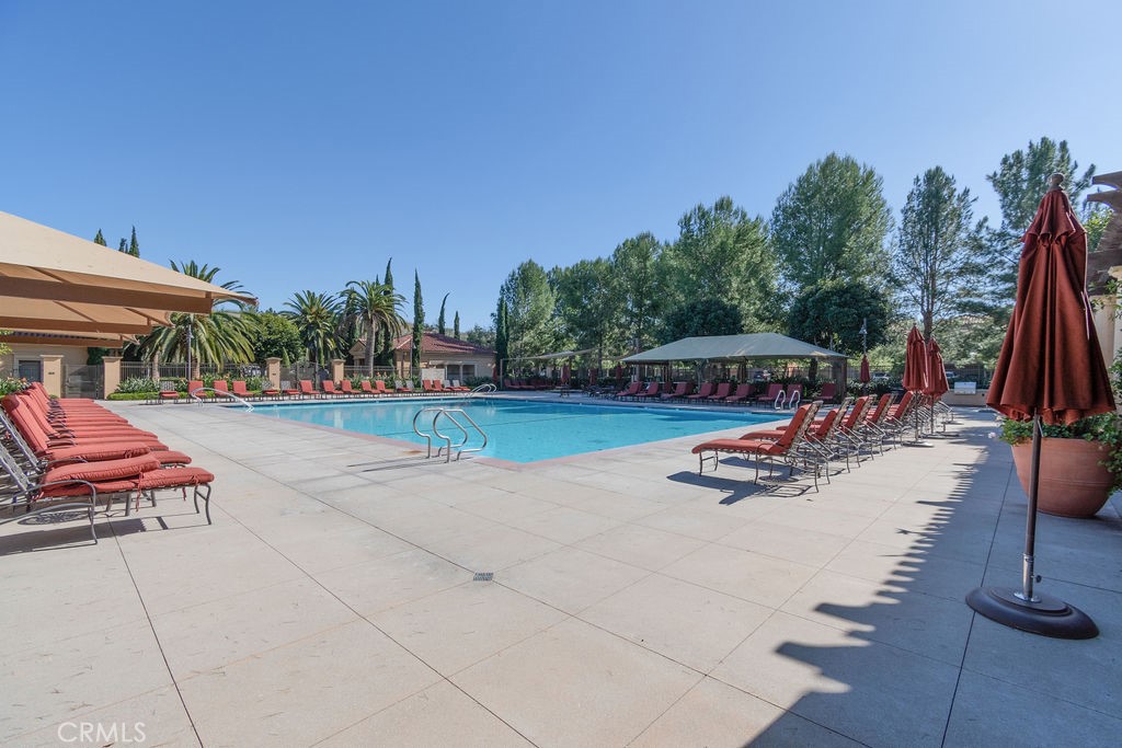 58 Cipresso Irvine, CA 92618 - Photo 29 of 34 a view of a swimming pool with sitting area and furniture