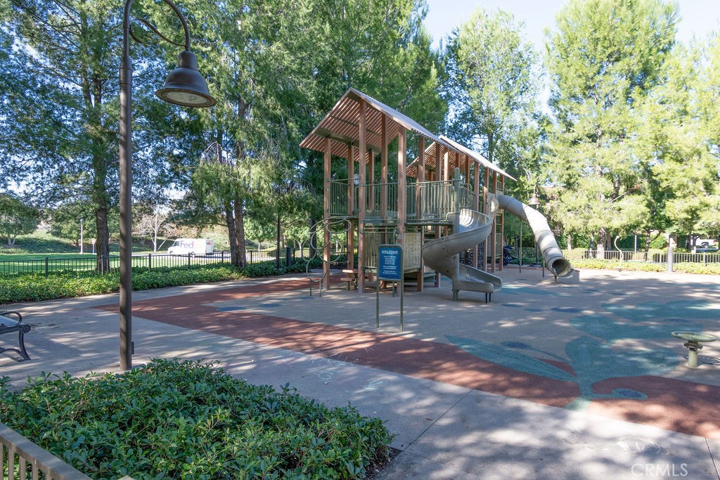 58 Cipresso Irvine, CA 92618 - Photo 30 of 34 a view of a house with yard and tree s