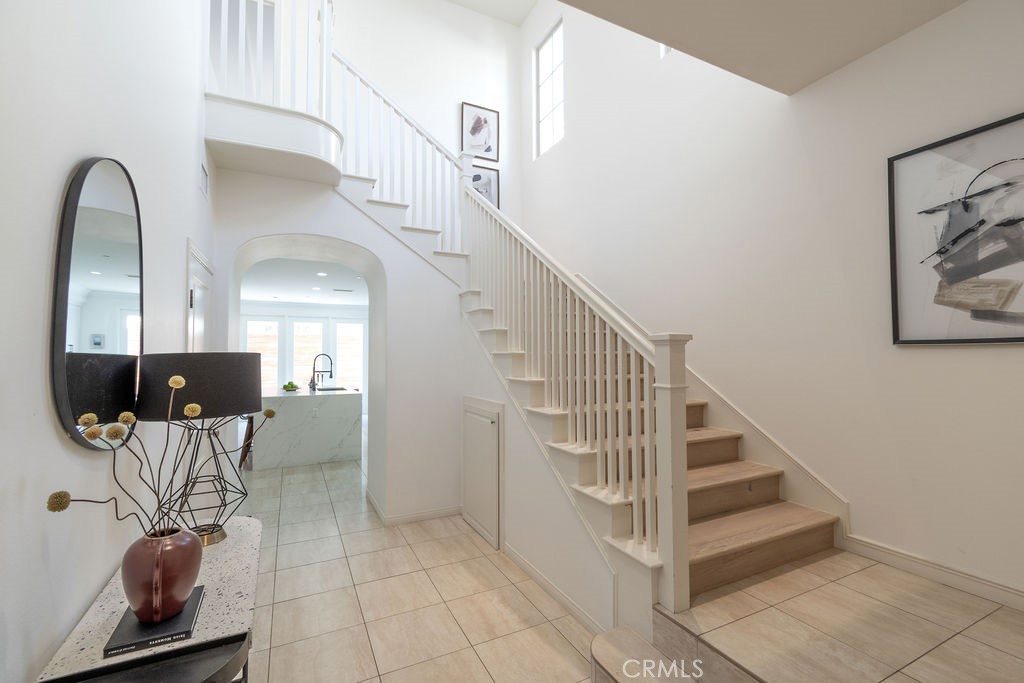 58 Cipresso Irvine, CA 92618 - Photo 3 of 34 a view of entryway and hall with wooden floor