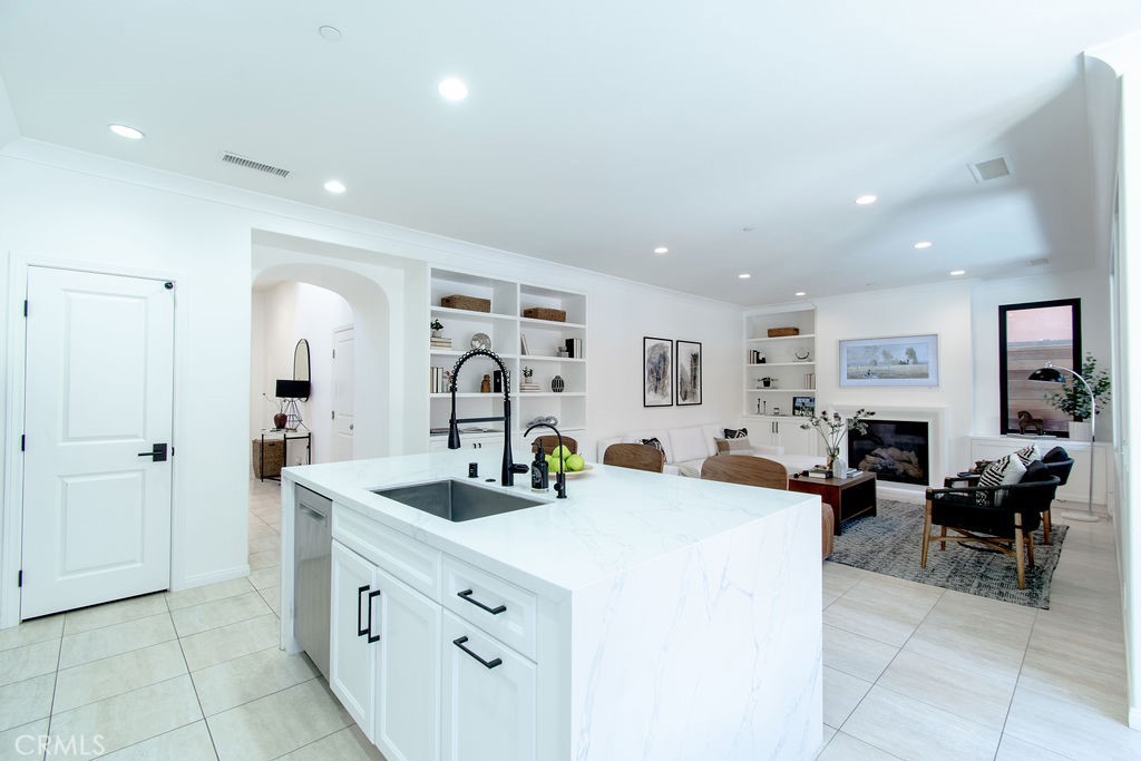 58 Cipresso Irvine, CA 92618 - Photo 10 of 34 a large room with mirror and sink