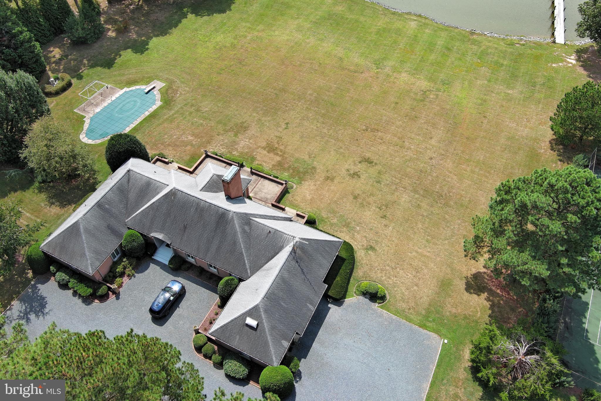9338 Bantry Road Easton, MD 21601 - Photo 7 of 43 an aerial view of a house with a yard