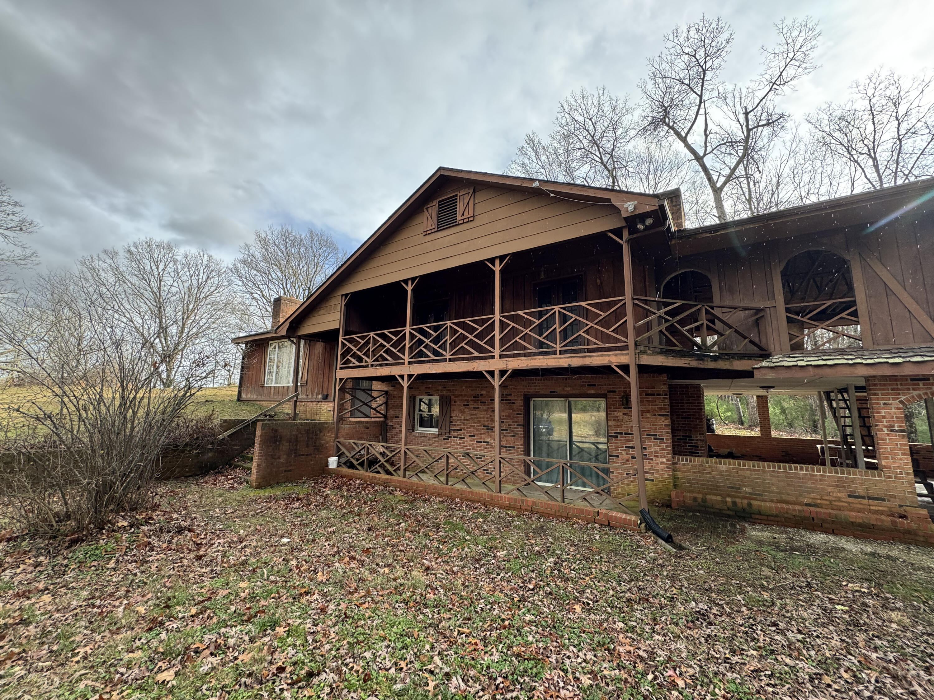 5341 Robinson Tract Road Pulaski, VA 24301 - Photo 1 of 32 a front view of a house with garden