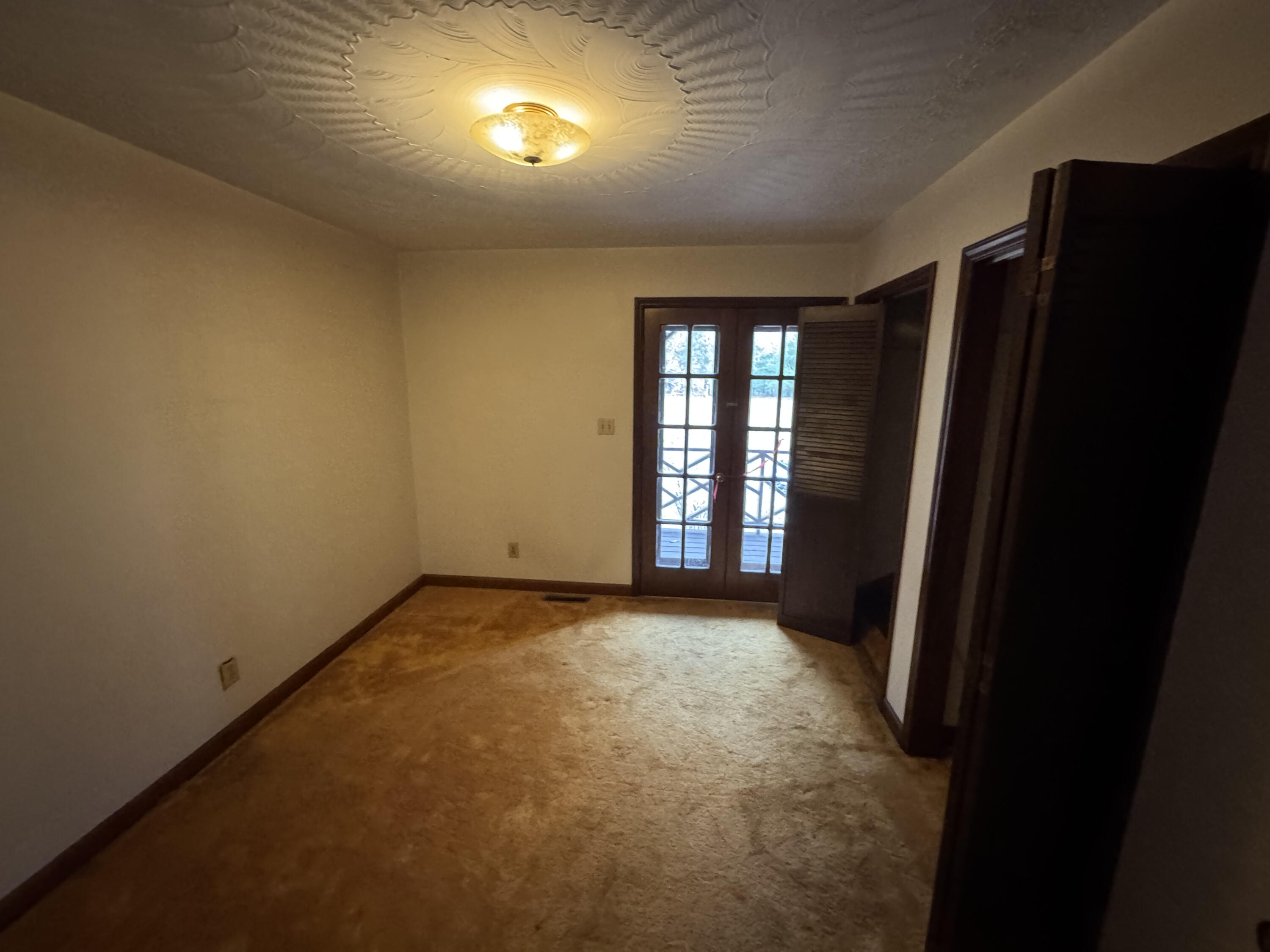 5341 Robinson Tract Road Pulaski, VA 24301 - Photo 11 of 32 an empty room with windows