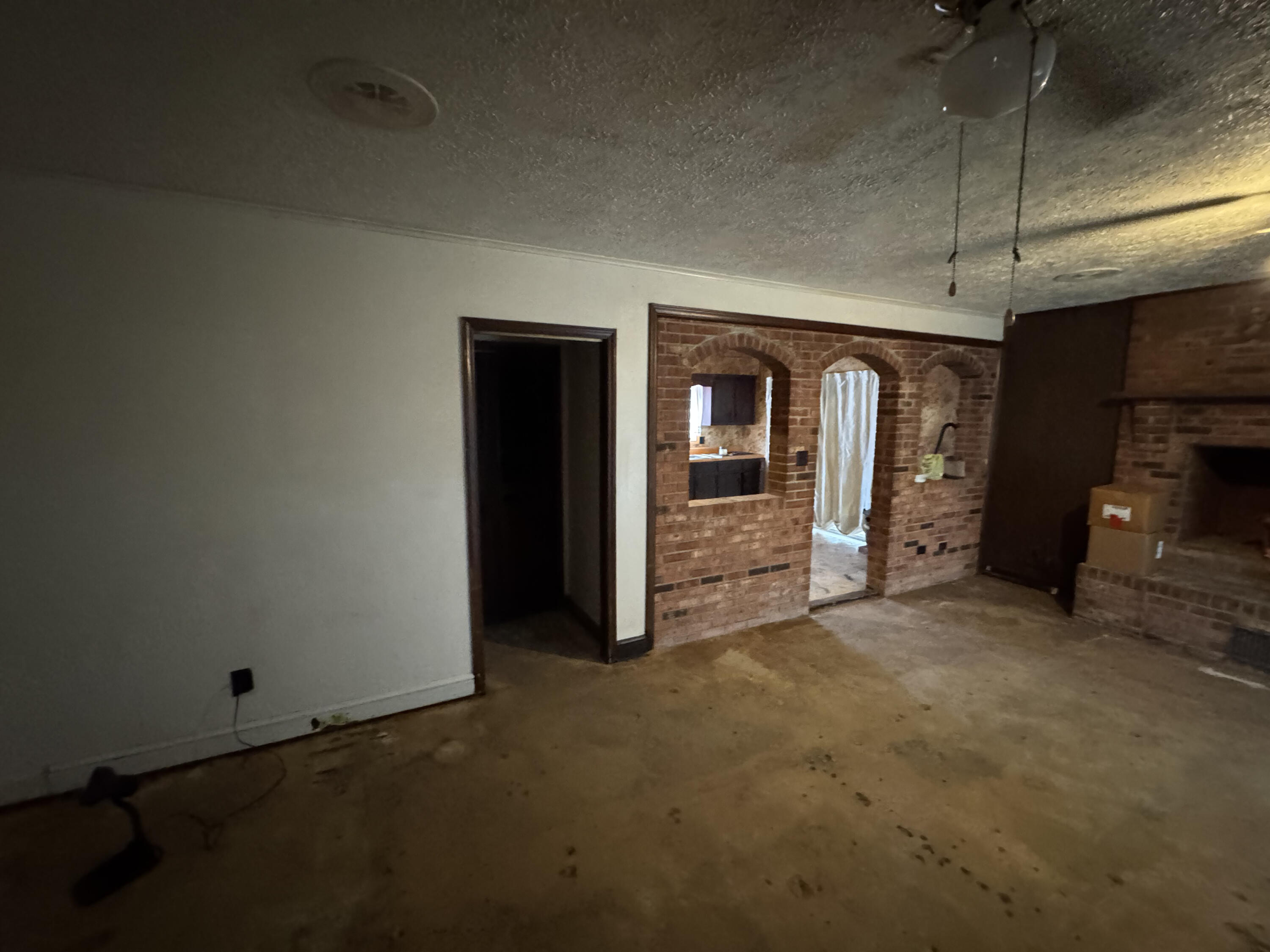 5341 Robinson Tract Road Pulaski, VA 24301 - Photo 15 of 32 an empty room with furniture and a fireplace