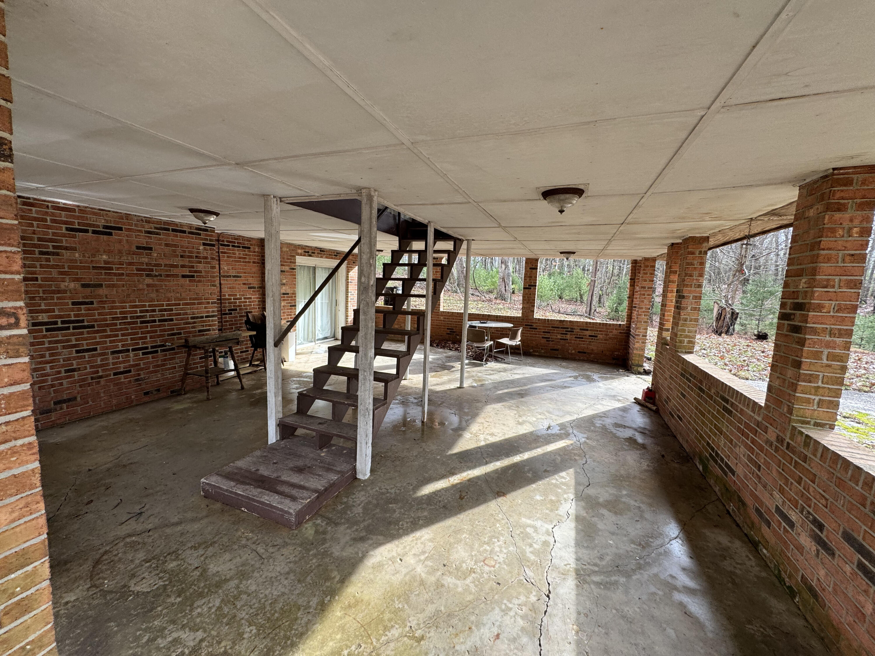 5341 Robinson Tract Road Pulaski, VA 24301 - Photo 20 of 32 a view of a room with lots of potted plants