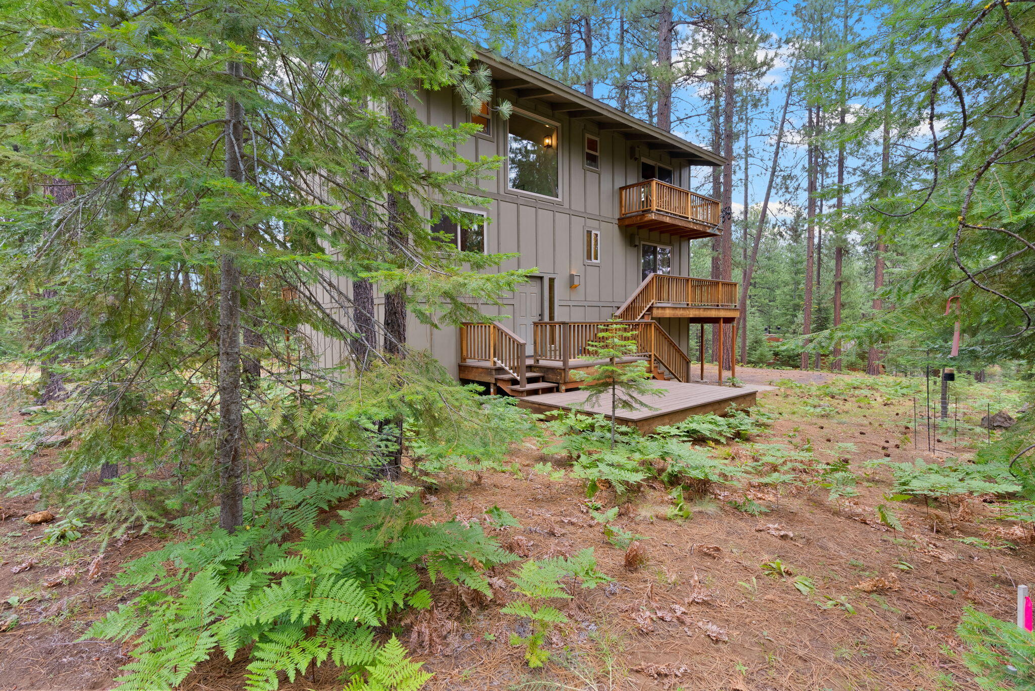13251 Snowbrush, Unit GH 266 Black Butte Ranch, OR 97759 - Photo 27 of 37 a view of a house with a yard