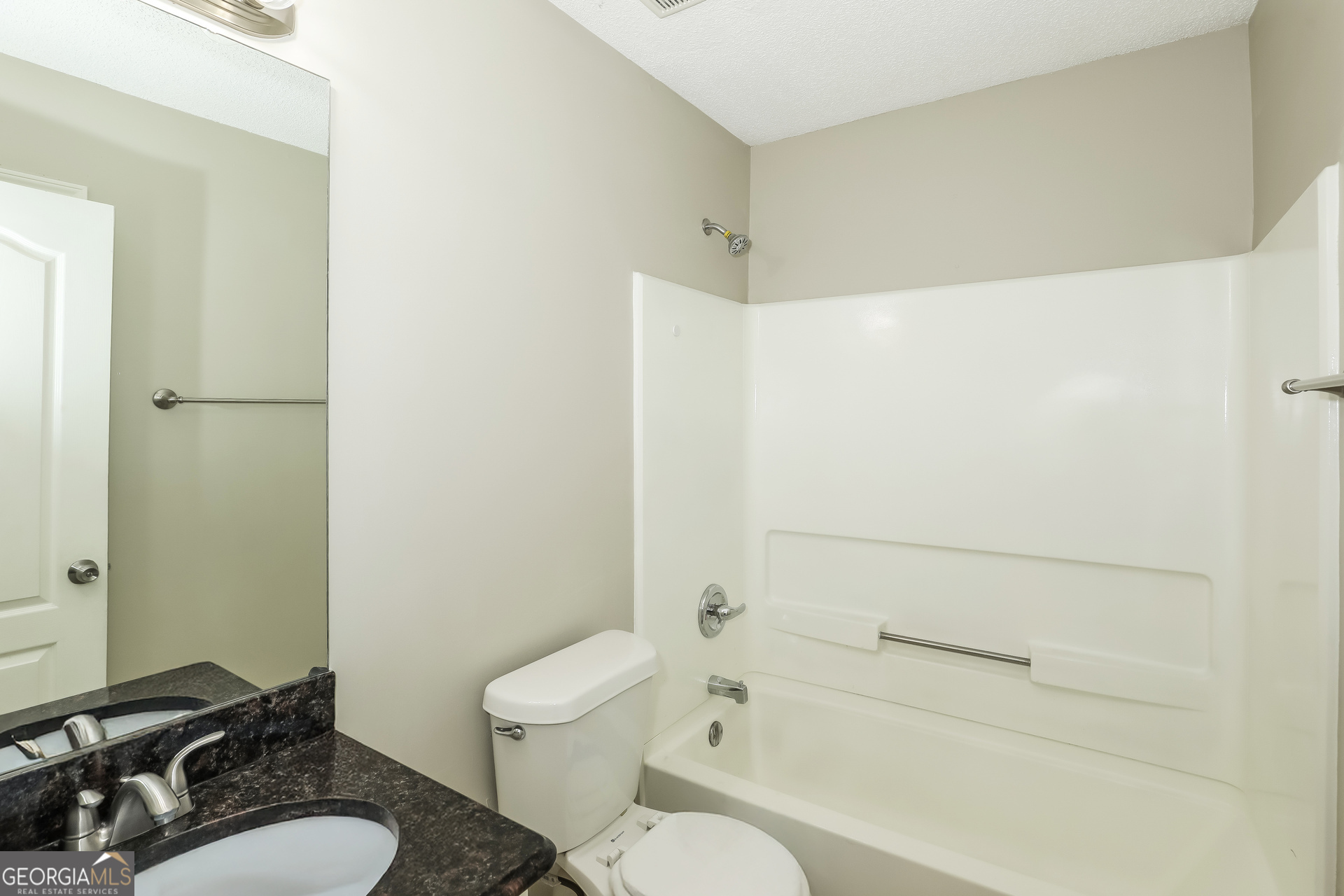 1085 Commons Court Jonesboro, GA 30238 - Photo 19 of 21 a bathroom with a sink toilet and shower