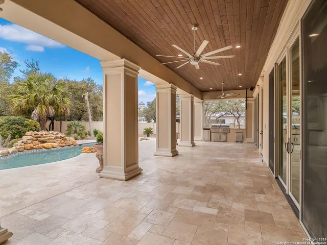 a view of a porch with a backyard