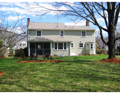 29 Eaton Road Needham, MA 02492 - Photo 2 of 15 a front view of a house with a garden