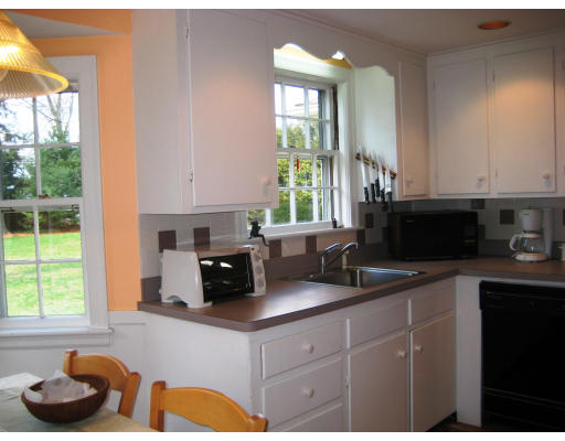 29 Eaton Road Needham, MA 02492 - Photo 6 of 15 a kitchen with a sink and a window