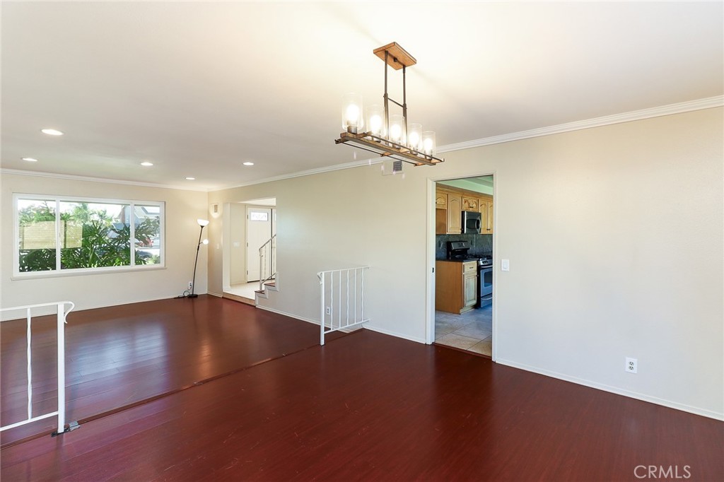 2167 Baseline Road La Verne, CA 91750 - Photo 7 of 7 a view of an empty room with wooden floor and a window