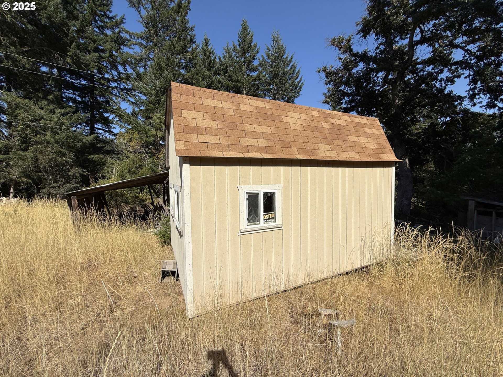 121 Cooke Road White Salmon, WA 98672 - Photo 26 of 48 a view of a house with a backyard