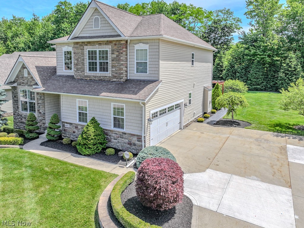 8375 Raleigh Place Painesville, OH 44077 - Photo 2 of 45 Seller added more cultured stone and shake vinyl siding to improve curb appeal
