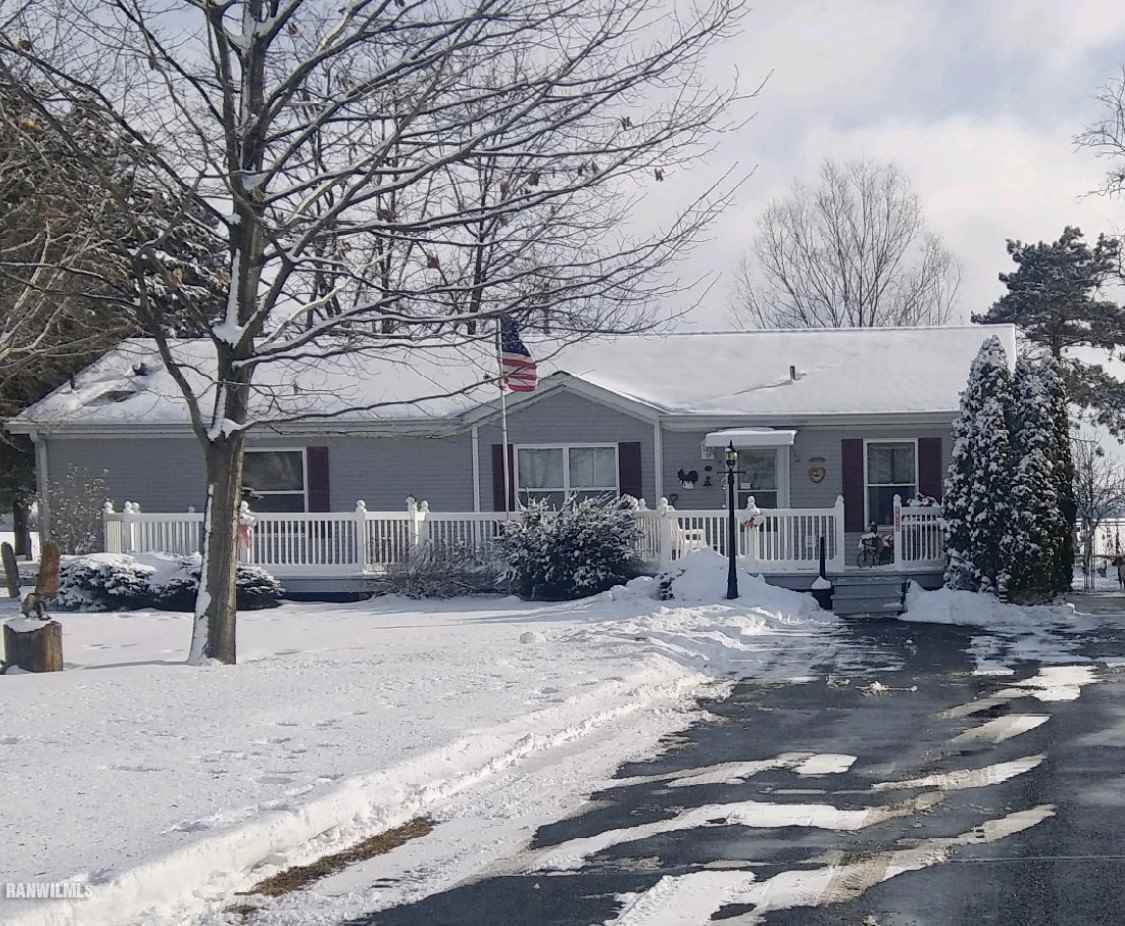 a front view of a house with a patio