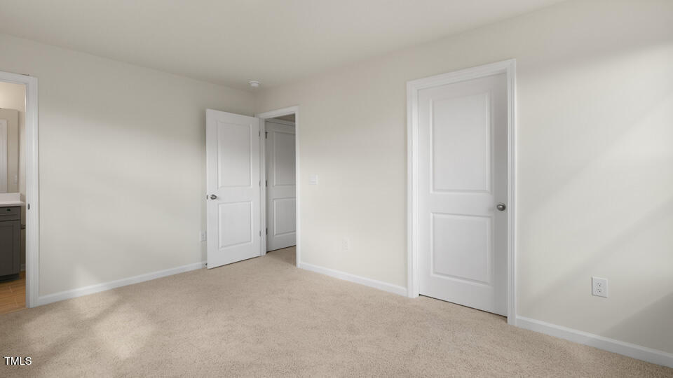 166 Red Jasper Way Clayton, NC 27520 - Photo 16 of 41 a view of an empty room