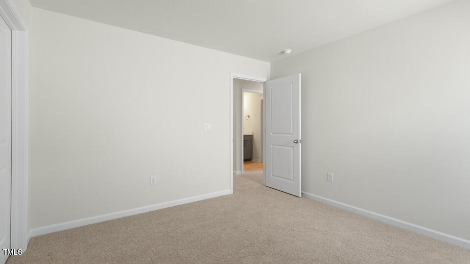 166 Red Jasper Way Clayton, NC 27520 - Photo 27 of 41 a view of an empty room