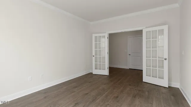 a kitchen with a sink appliances and cabinets