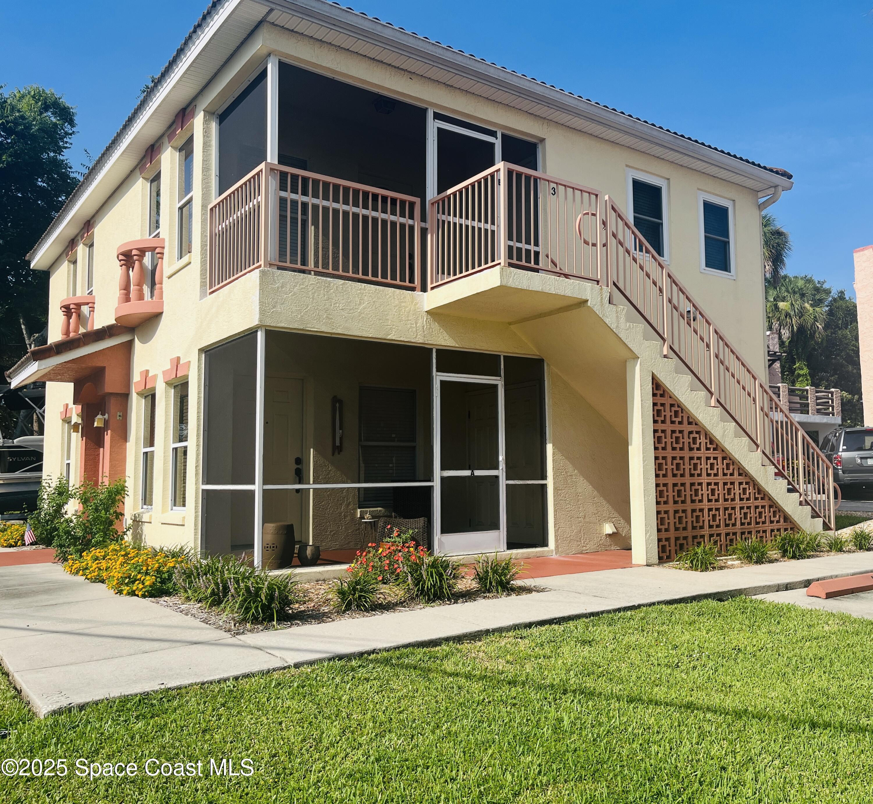 3 Florida Avenue, Unit B Cocoa, FL 32922 - Photo 1 of 10 a front view of a house with garden
