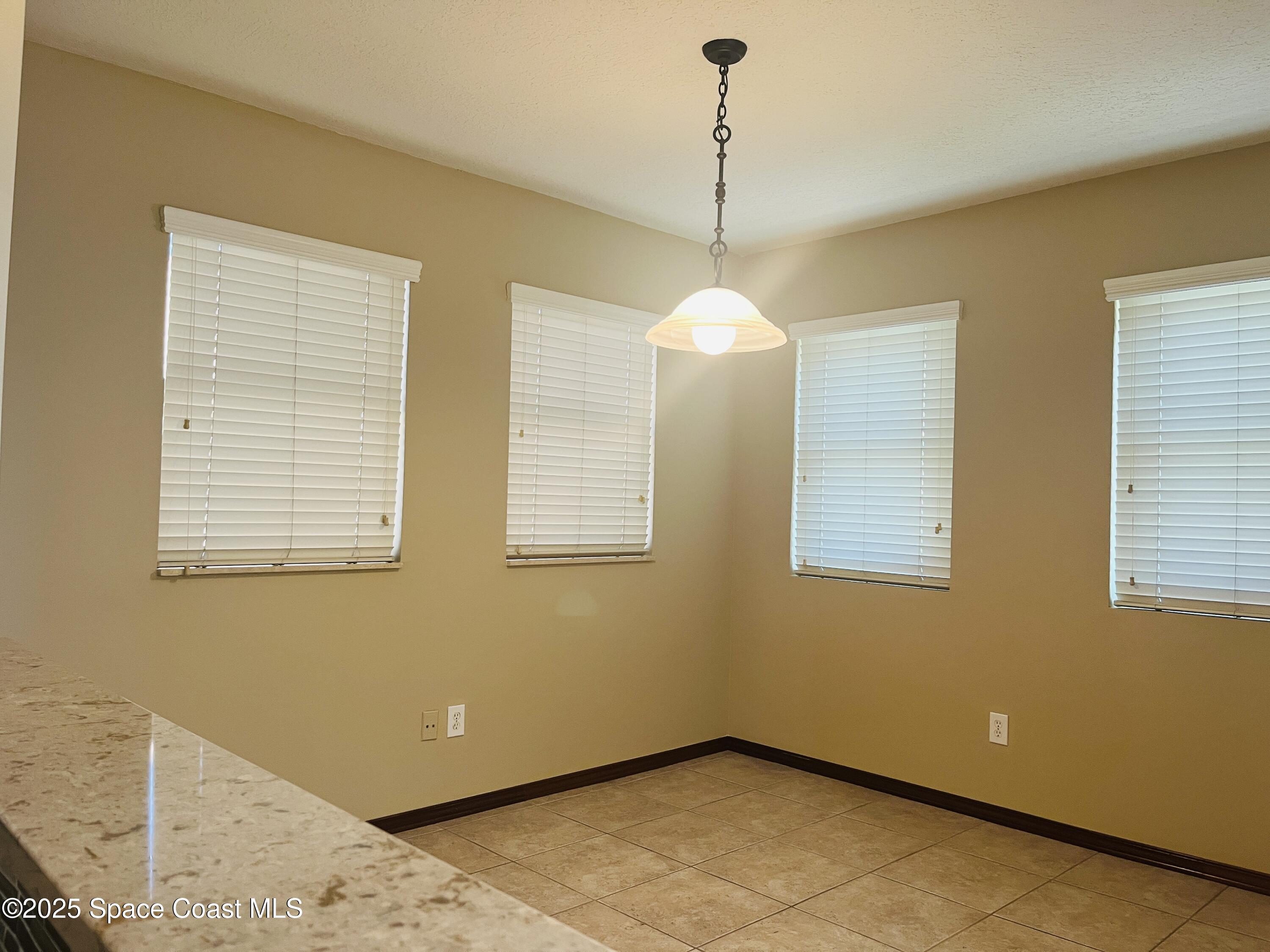3 Florida Avenue, Unit B Cocoa, FL 32922 - Photo 5 of 10 a view of a room with windows