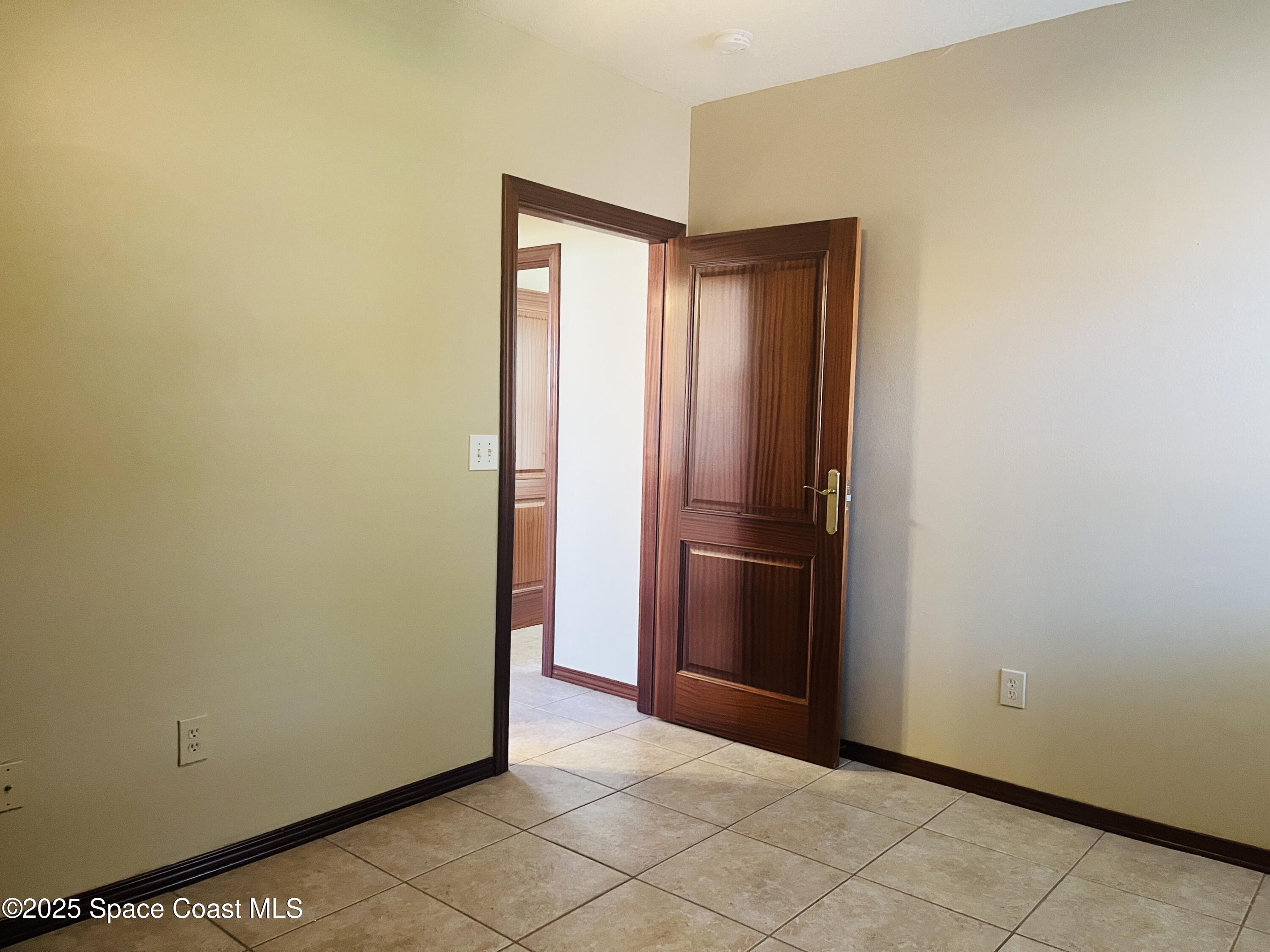 3 Florida Avenue, Unit B Cocoa, FL 32922 - Photo 6 of 10 a view of kitchen with refrigerator