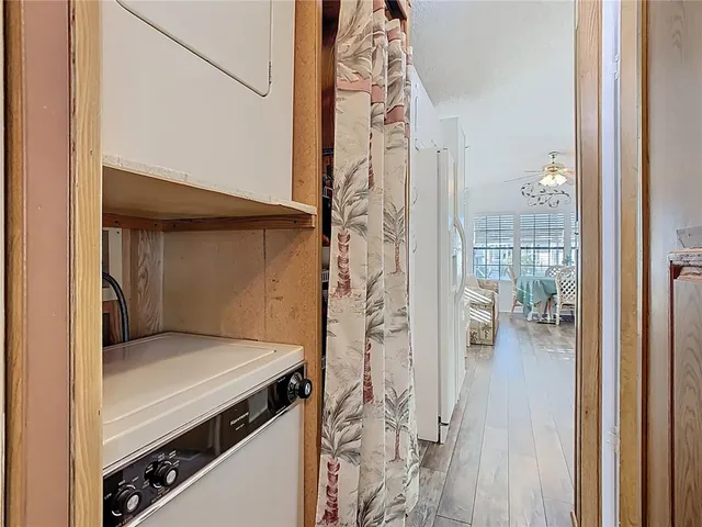 a kitchen with a stove and a shower