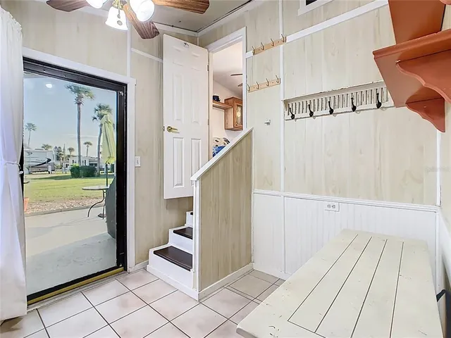 a view of a hallway with staircase