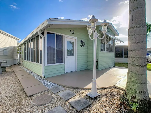 a view of a house with a small porch