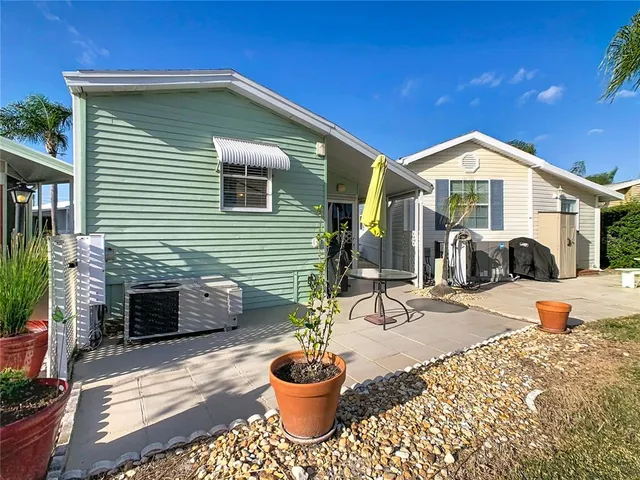 a front view of a house with a patio