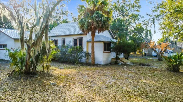 a view of a backyard with a garden