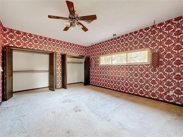 a view of a room with a large window