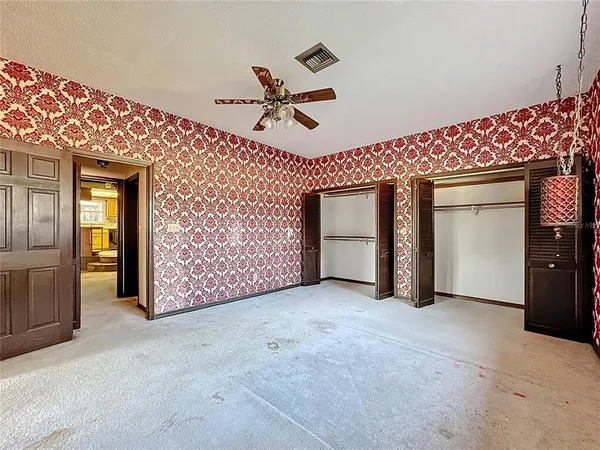 a view of a porch with wooden floor and deck
