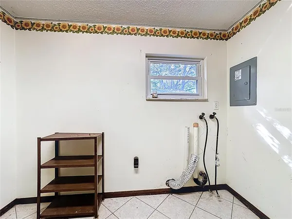 a view of a porch with wooden floor and stairs