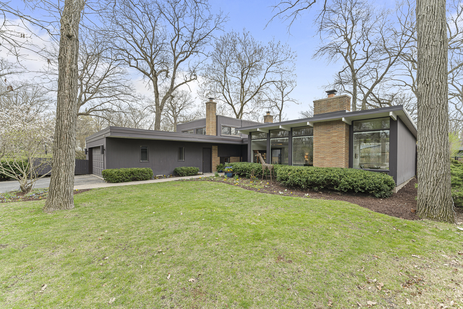 1916 Berkeley Road Highland Park, IL 60035 - Photo 1 of 30 a view of an house with backyard space and garden