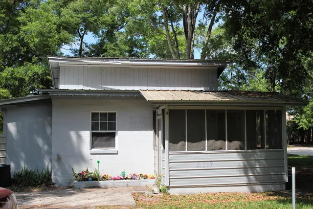 front view of house with a small yard