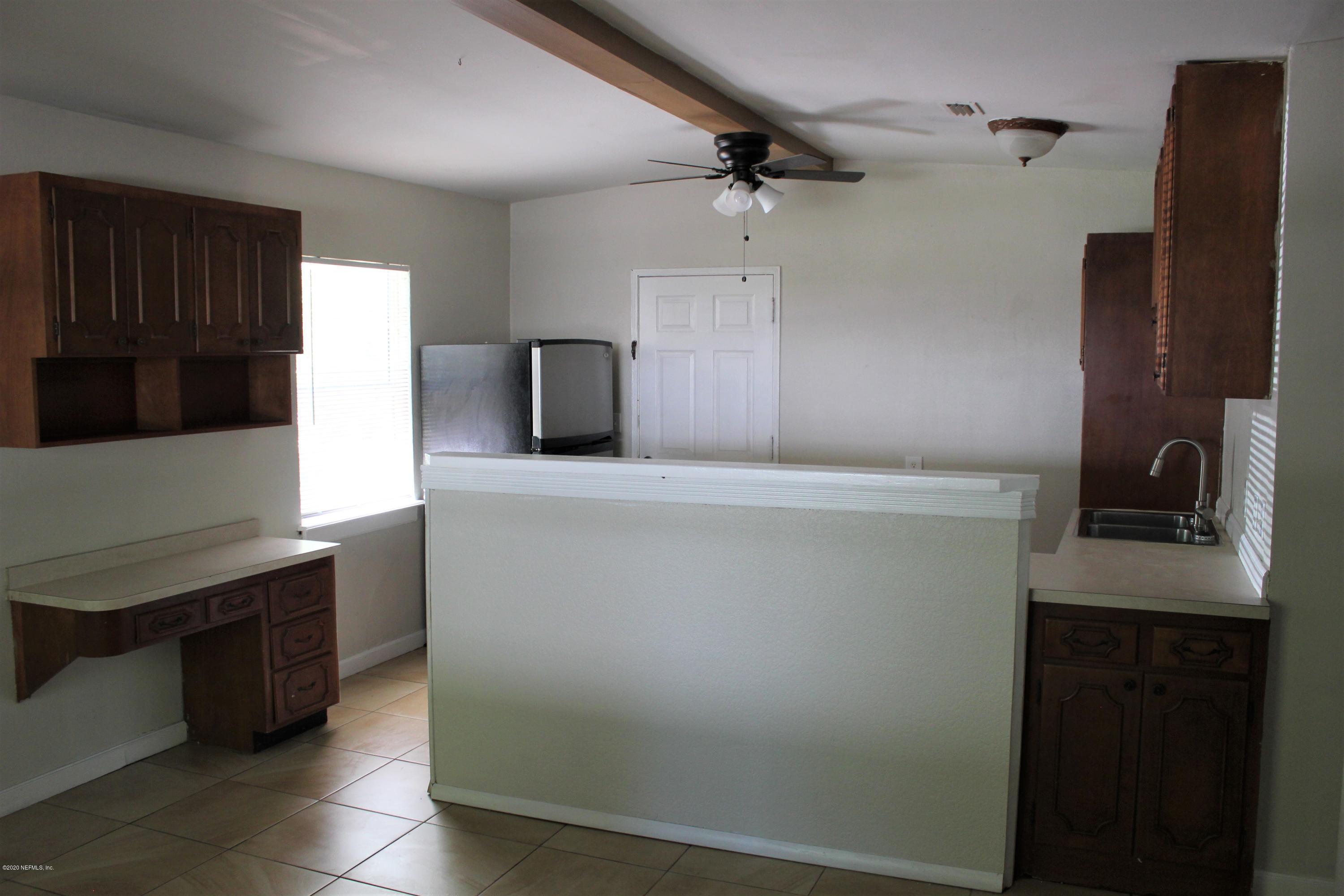 6317 Delacy Road Jacksonville, FL 32244 - Photo 11 of 12 a utility room with washer and dryer