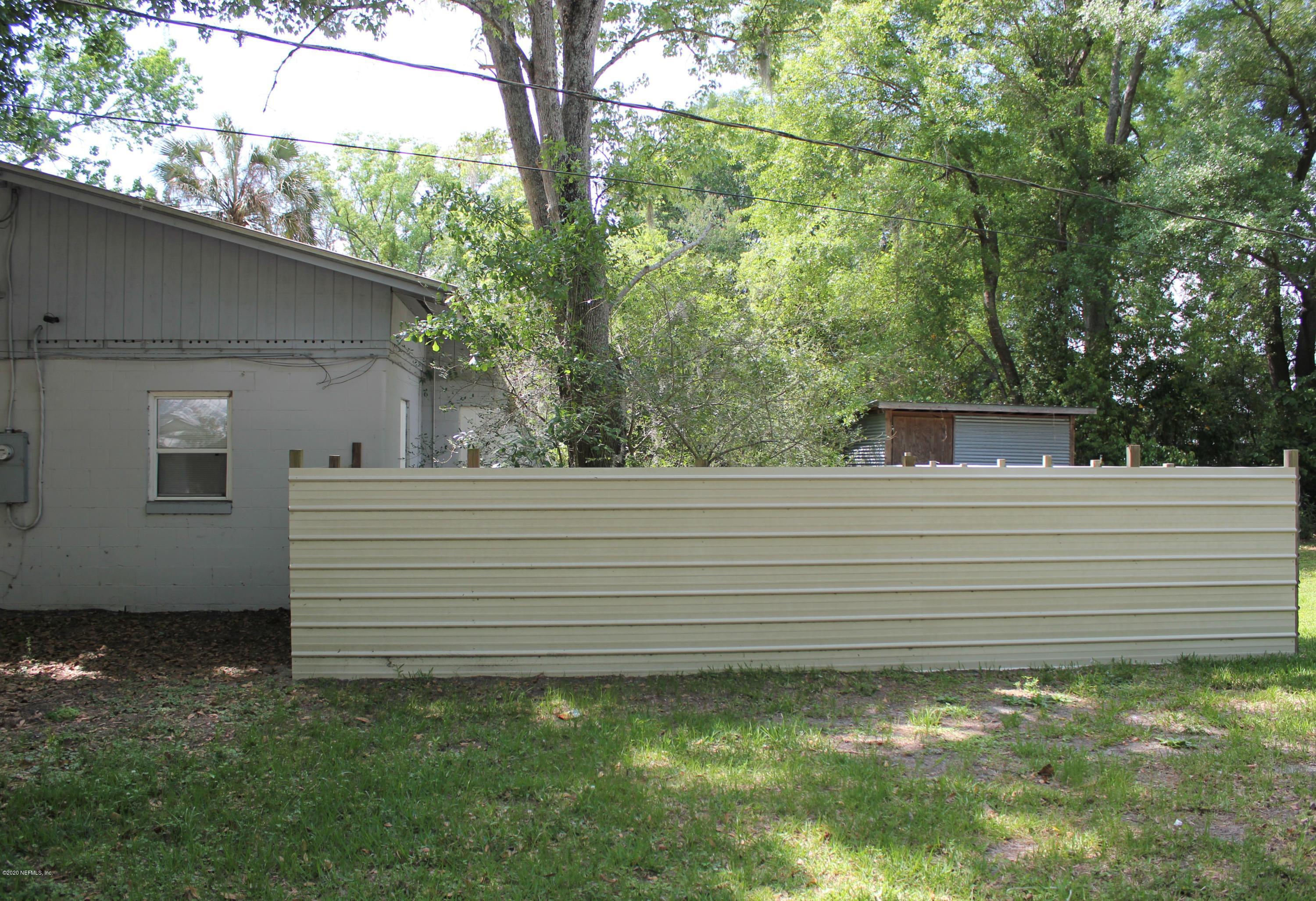 6317 Delacy Road Jacksonville, FL 32244 - Photo 2 of 12 a view of a backyard