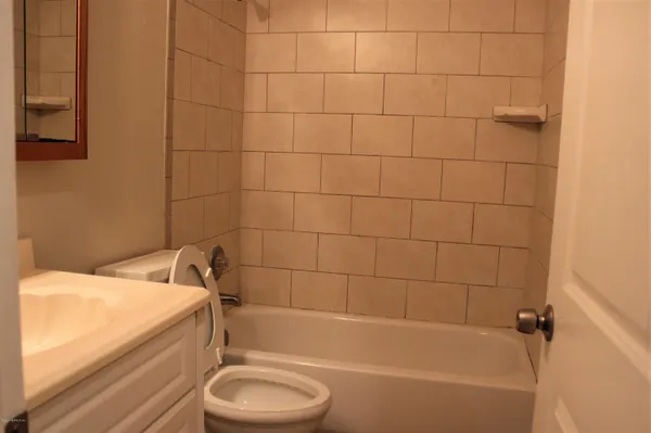 a bathroom with a sink and bathtub