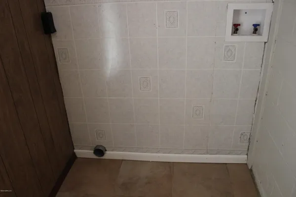 a utility room with washer and dryer