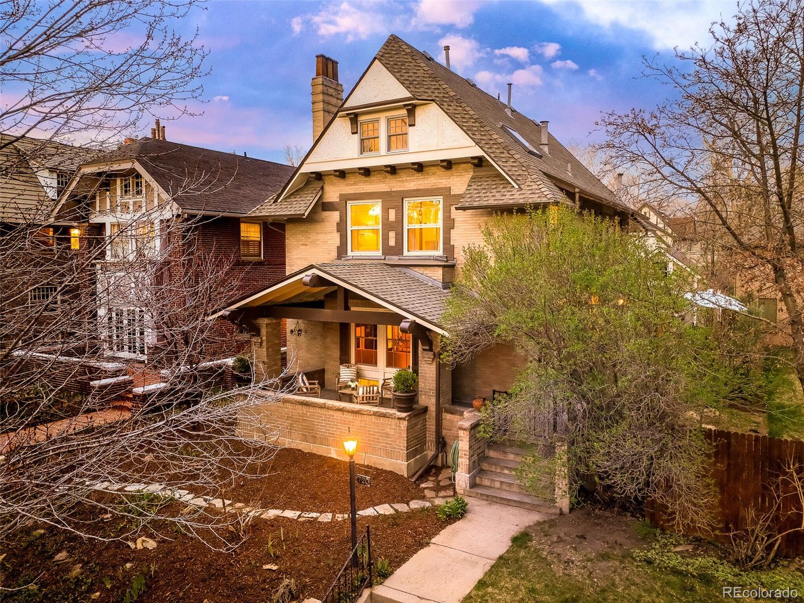 720 Franklin Street Denver, CO 80218 - Photo 1 of 38 a front view of a house with a yard