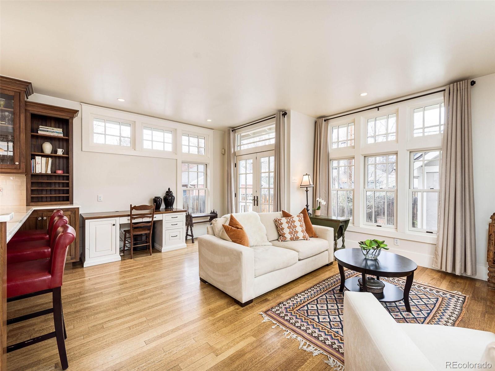 720 Franklin Street Denver, CO 80218 - Photo 11 of 38 a living room with furniture and floor to ceiling windows
